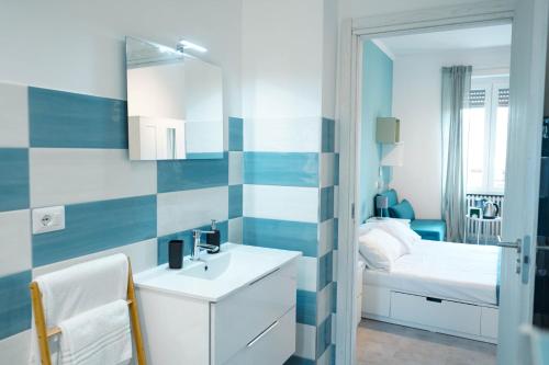 Postel nebo postele na pokoji v ubytování Salotto Tiburtino