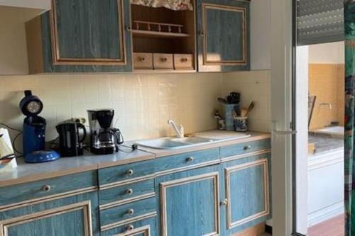 Η κουζίνα ή μικρή κουζίνα στο Le Neptune place de Marbre plage et port