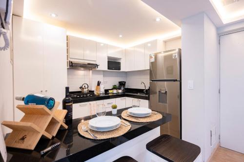 Η κουζίνα ή μικρή κουζίνα στο Private Residences by Vibrant