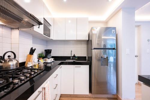 Η κουζίνα ή μικρή κουζίνα στο Private Residences by Vibrant