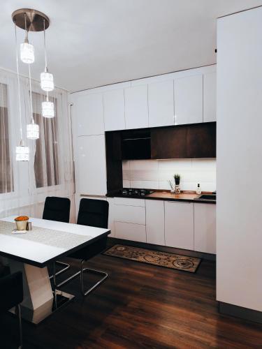 Η κουζίνα ή μικρή κουζίνα στο Zen Apartman