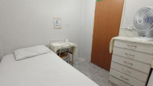 Ένα ή περισσότερα κρεβάτια σε δωμάτιο στο Casa quarto dormitório estudantil em salobrinho para uescquianos