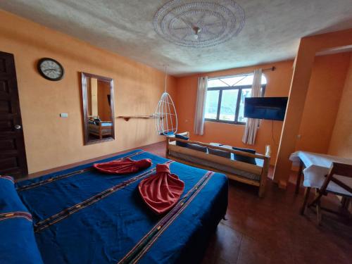 TV a/nebo společenská místnost v ubytování El Viajero Rooms