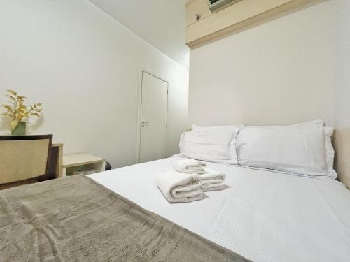 Postel nebo postele na pokoji v ubytování ENB | Ótima Suite hotel em SCS, próx a GM