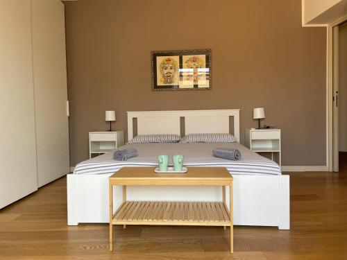 Katil atau katil-katil dalam bilik di Le Stanze di Federico e Costanza Luxury Apartments