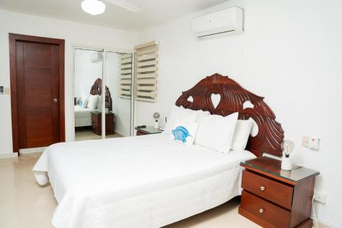 Postel nebo postele na pokoji v ubytování Apartamento Los Anturios en Puerto Plata Bayardo