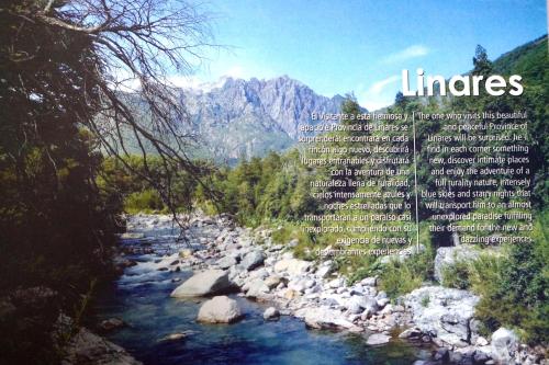 a picture of a river with mountains in the background at Residencial del Maule in Linares