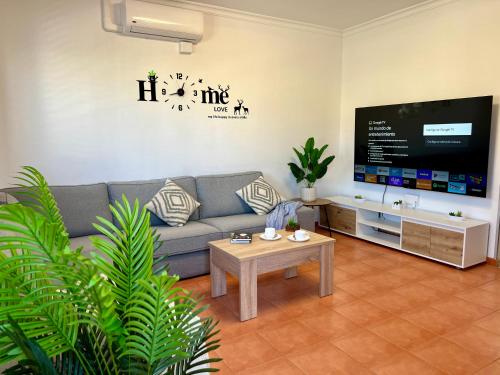 Χώρος καθιστικού στο Villa Puerto Rico in front of the shopping center with private heated saltwater pool with jacuzzi & t able fút boll & arcade games OR St andard Villa Puerto Rico in front of the shopping center with private heated saltwater big jacuzzi & arcade games