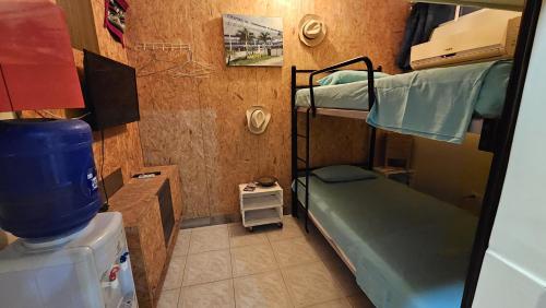 Postel nebo postele na pokoji v ubytování Villa de María