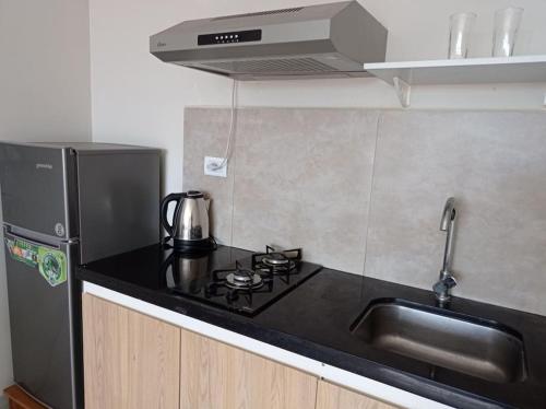 Majoituspaikan Mono ambiente cómodo keittiö tai keittotila