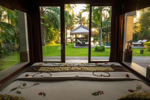 Сад в Relax Bali Dive & SPA ocean front resort