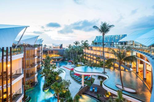 an overhead view of a swimming pool at a resort at Le Meridien Bali Jimbaran in Jimbaran