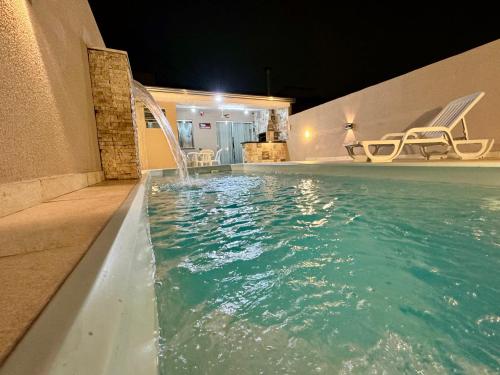 Kolam renang di atau dekat dengan Balneário Céu Azul, com piscina - Matinhos