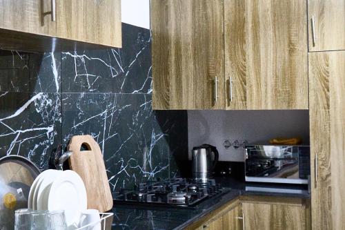 Una cocina o cocineta en FG Résidence