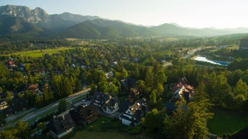 an aerial view of a town in the mountains at New Willa Jan in Zakopane