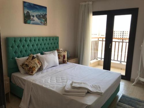 Ένα ή περισσότερα κρεβάτια σε δωμάτιο στο Egypt Traveler Hotel