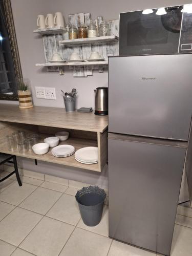 Una cocina o zona de cocina en 21on2nd Avenue