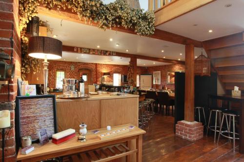 A restaurant or other place to eat at Tonge Barn