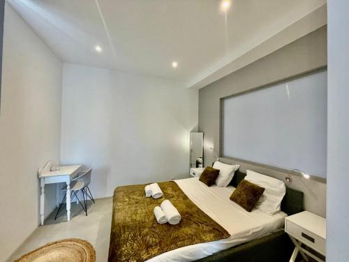 Ένα ή περισσότερα κρεβάτια σε δωμάτιο στο Apartment Monaco Beach Grimaldi Forum