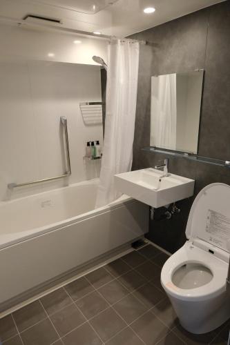 Koupelna v ubytování Belmont Hotel