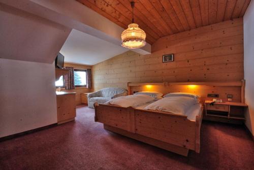 Postel nebo postele na pokoji v ubytování Hotel Urthaler
