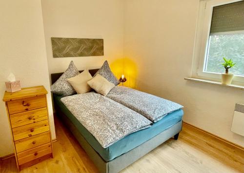 Ένα ή περισσότερα κρεβάτια σε δωμάτιο στο Apartment Ilm-Oase-Vollausstattung-Netflix-RTLPlus