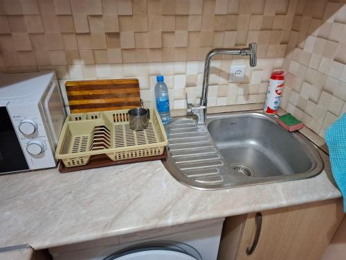 Dapur atau dapur kecil di Hasmik Apartment