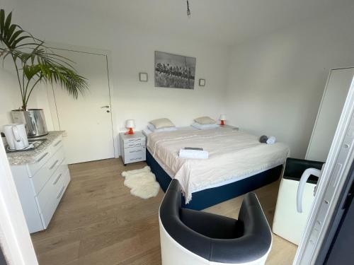Ein Bett oder Betten in einem Zimmer der Unterkunft Green Garden Apartments