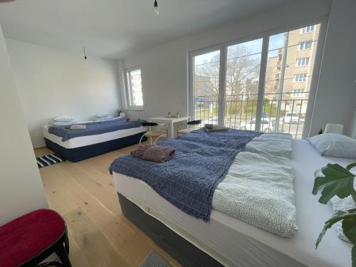 Ein Bett oder Betten in einem Zimmer der Unterkunft Green Garden Apartments