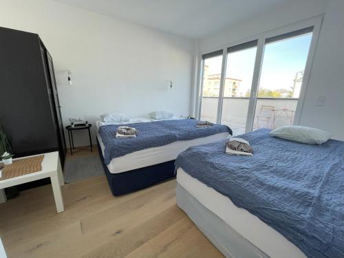 Ein Bett oder Betten in einem Zimmer der Unterkunft Green Garden Apartments