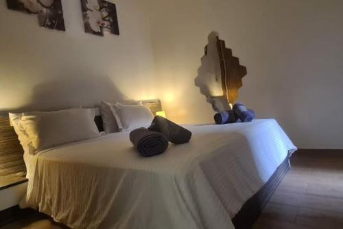 Ένα ή περισσότερα κρεβάτια σε δωμάτιο στο appartement de luxe gueliz