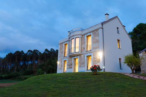 Zahrada ubytování Villa Rosa Apartamentos en casa rural con vistas panoramicas a la ria