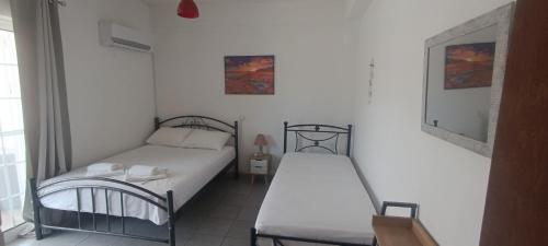 Posteľ alebo postele v izbe v ubytovaní CAMARES HOUSE