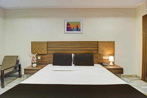 Katil atau katil-katil dalam bilik di Hotel O Srujana Stay Inn