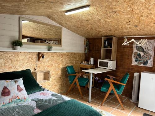 Kuchyň nebo kuchyňský kout v ubytování Le chalet des 3 canards
