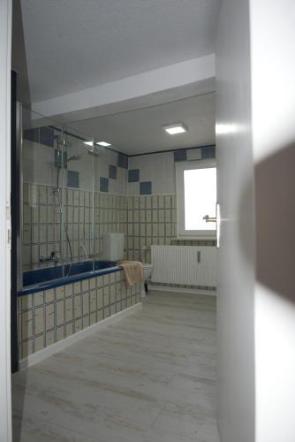 Ένα μπάνιο στο Ferienwohnung Frieda