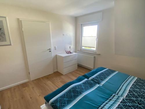 Postel nebo postele na pokoji v ubytování Ferienwohnung in ruhiger Lage
