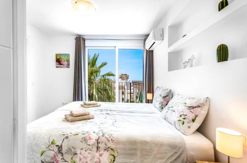 Ένα ή περισσότερα κρεβάτια σε δωμάτιο στο Villa Chispita & Sevilla Torreblanca