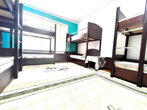 Assalom Hostelにあるベッド