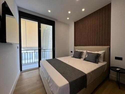 Postel nebo postele na pokoji v ubytování BlueMotion - PortSuite 5B