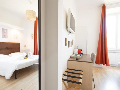 Voodi või voodid majutusasutuse Romerooms Cola di Rienzo toas