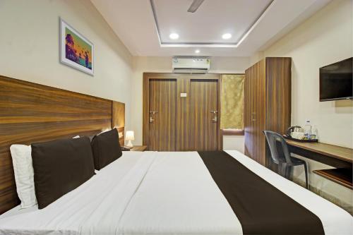 Katil atau katil-katil dalam bilik di Hotel O Srujana Stay Inn