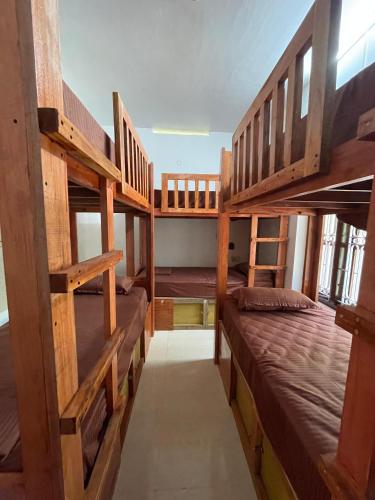 a room with two bunk beds and a bed at Kulture KonnectT in Varkala