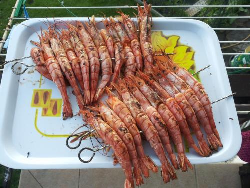 a bunch of carrots on a white tray at GIULIA e ANDREA in Bellano
