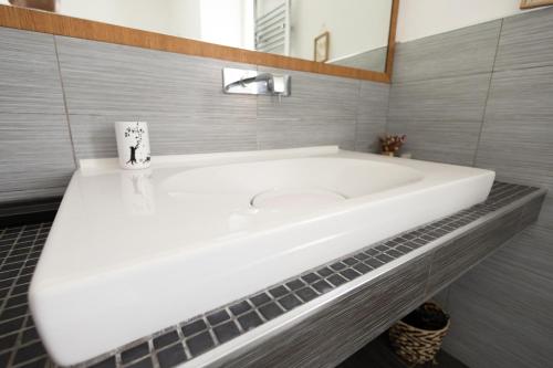 Vannituba majutusasutuses Romerooms Cola di Rienzo