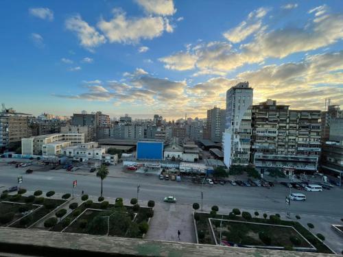 a view of a city with a parking lot at شارع الجيش in Kafr Abū Dabbūs