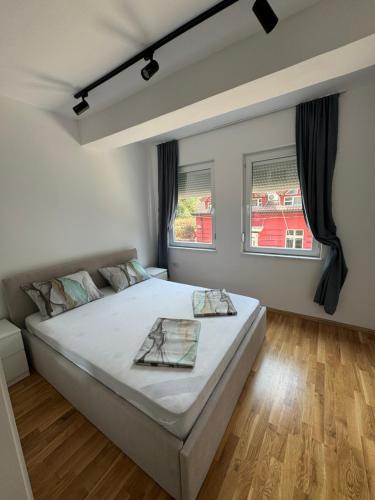Llit o llits en una habitació de NN Apartment 4