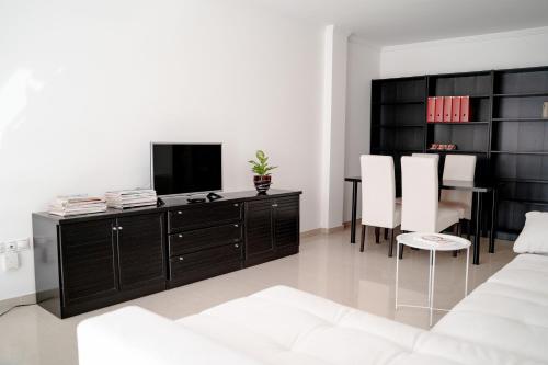 Et tv og/eller underholdning på A Cabana de Pado