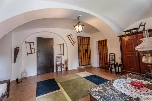 a large room with a table and chairs in it at Staveni 1818 in Heřmanice