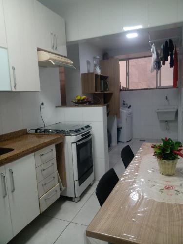 Køkken eller tekøkken på Apto praia do forte